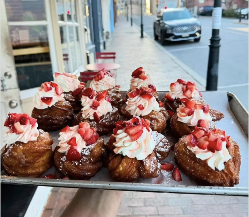 Pan of baked goods outside a store front